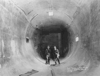 Kirsten (right) standing in the East tunnel circuit during construction, 1936 