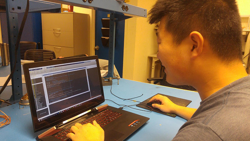 student looking at computer