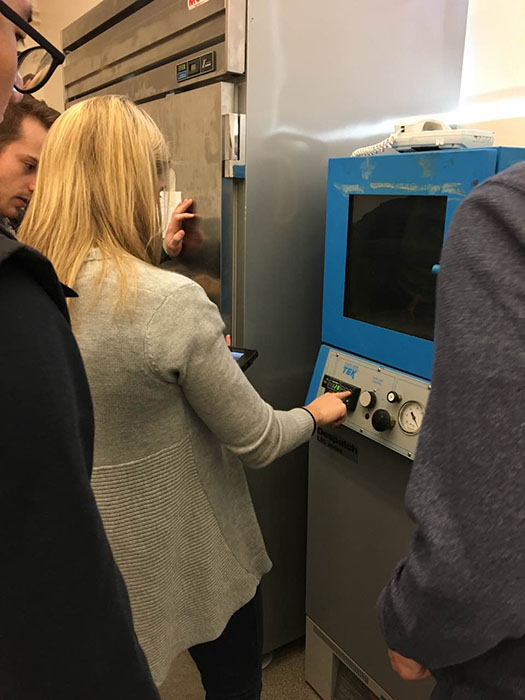 student using tube furnace