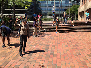 young students engaging in math academy outside UW Engineering library