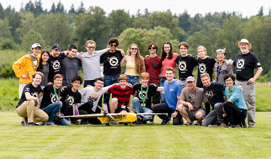 a group of people posing for a photo