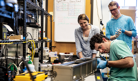 a group of people working in a lab