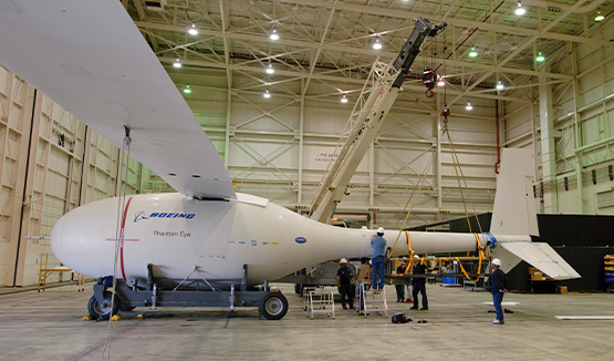 a group of people working on a plane