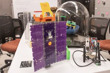 Husky Satellite's Lab CubeSat with purple panels