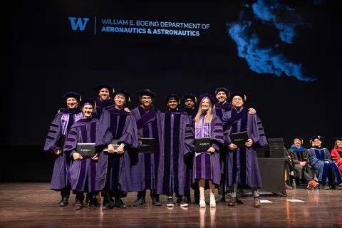 Group of recent graduates at a graduation ceremony