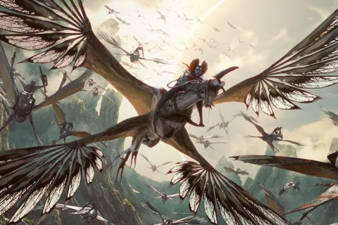 Blue-skinned rider, from the Avatar movie, flying through the sky on a winged creature, surrounded by mountainous cliffs.